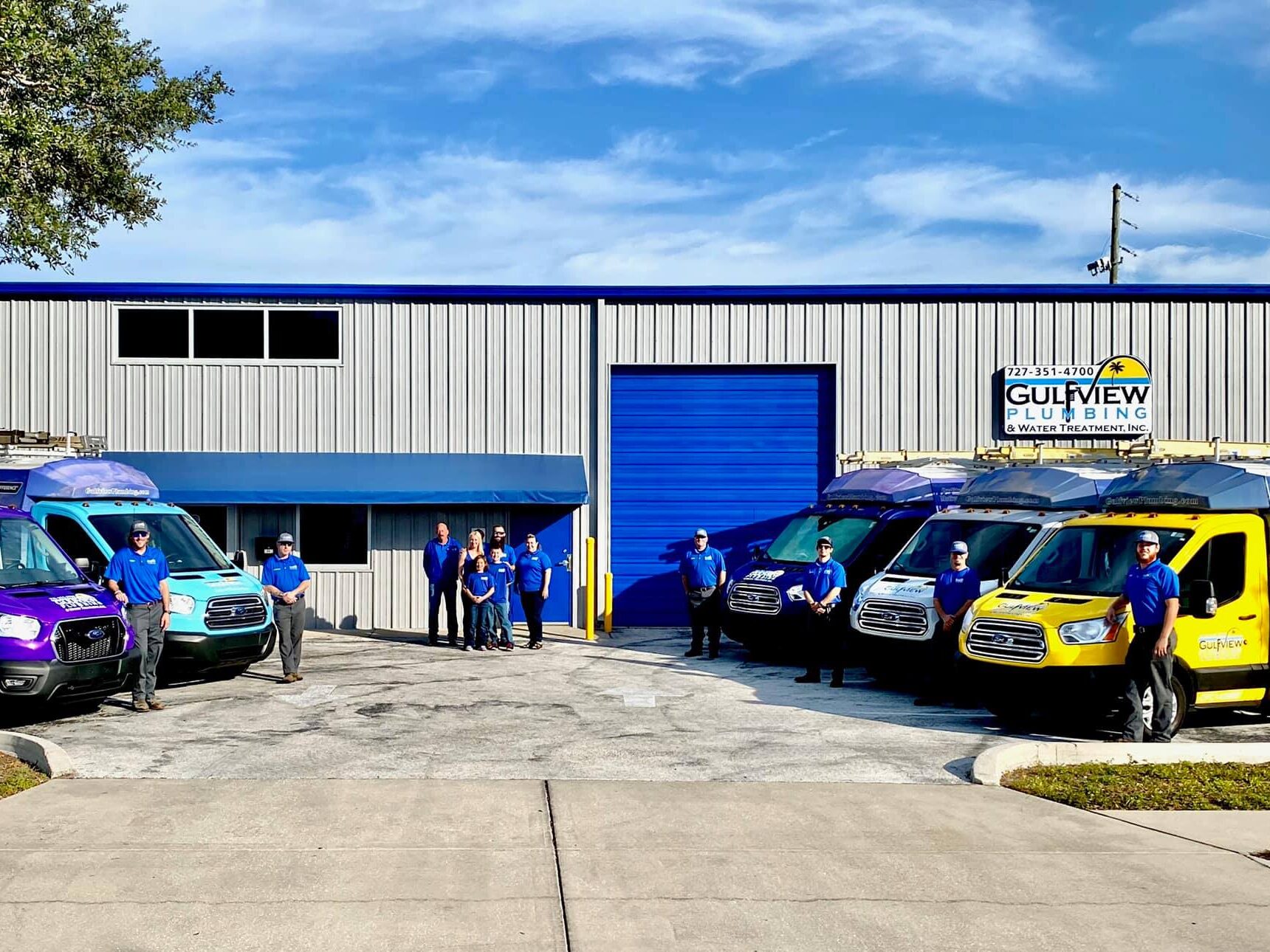 The Gulfview team with company service vehicles
